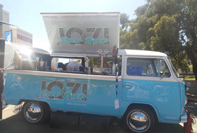 blue food truck with drinks